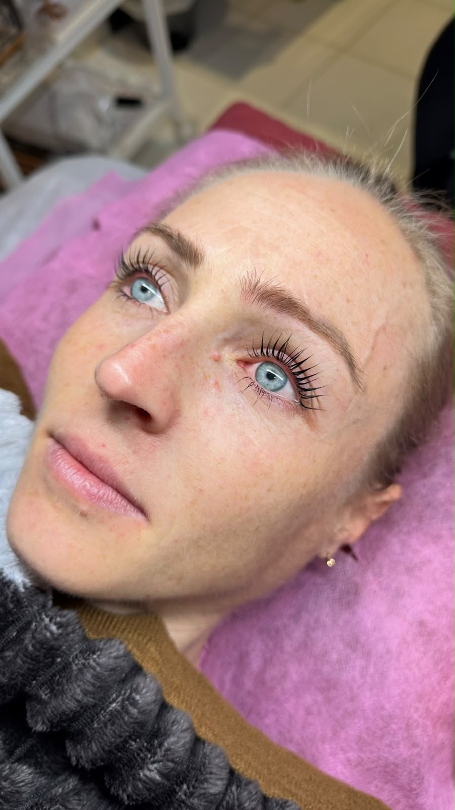 Client with fresh lash extensions
