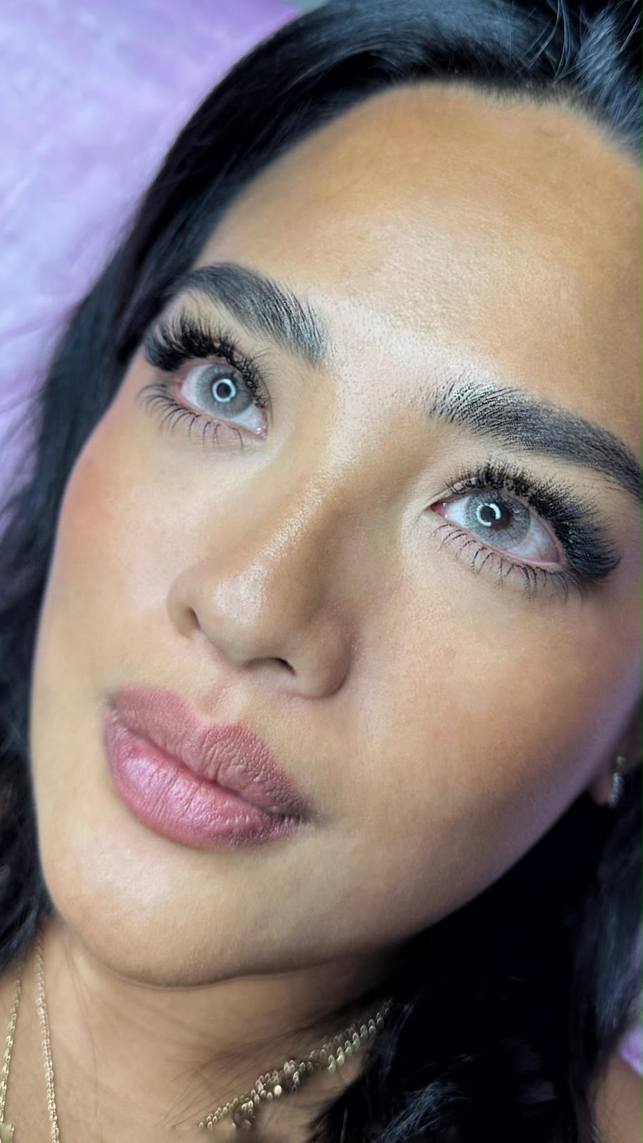 Client with lash extensions close-up